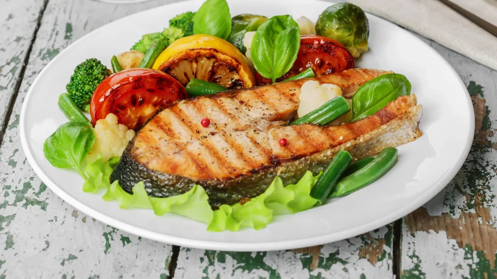 Pescado a la plancha con guarnición de vegetales